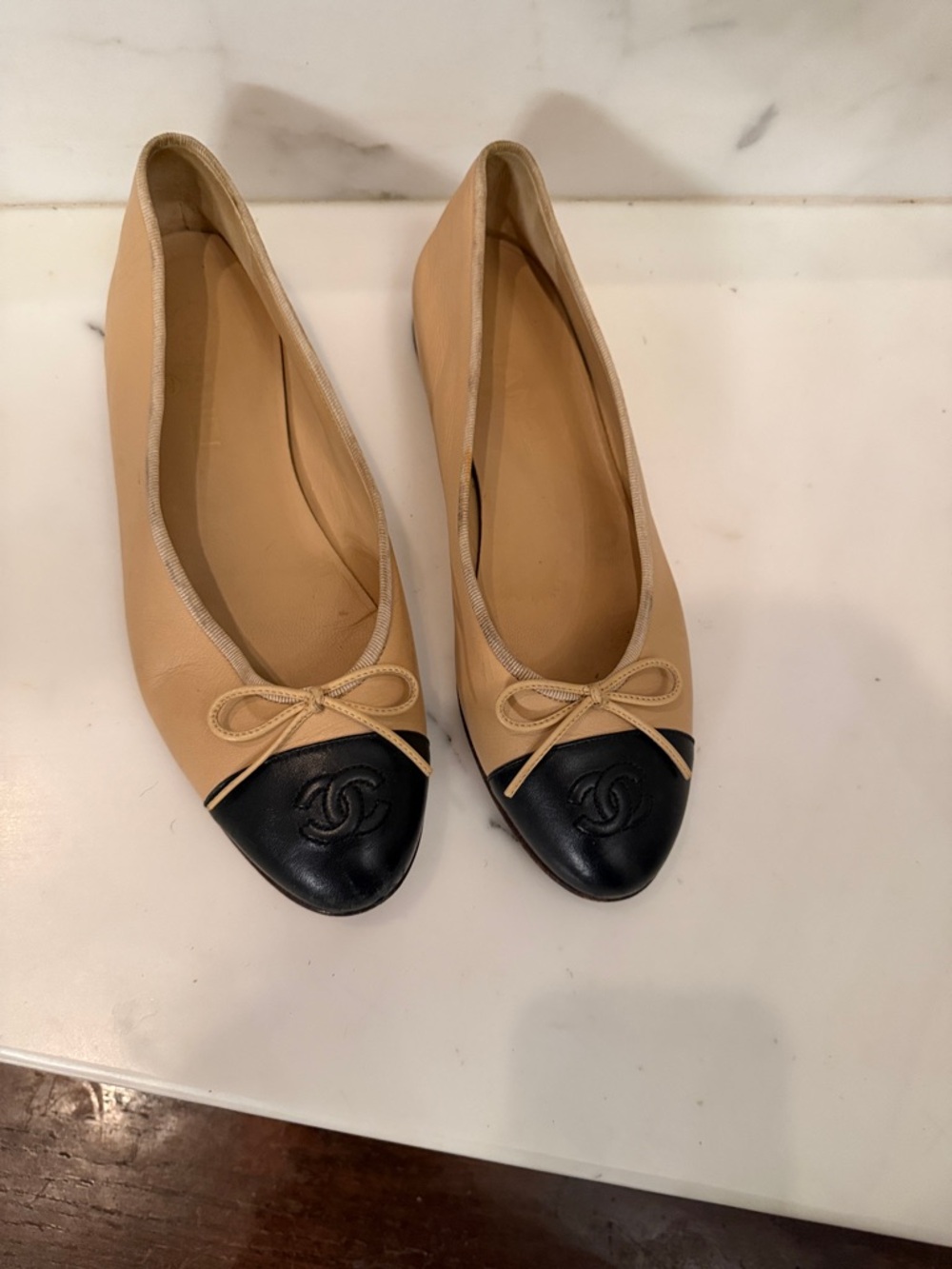 Chanel Two-Tone Cap-Toe Ballet Flats in Beige and Black